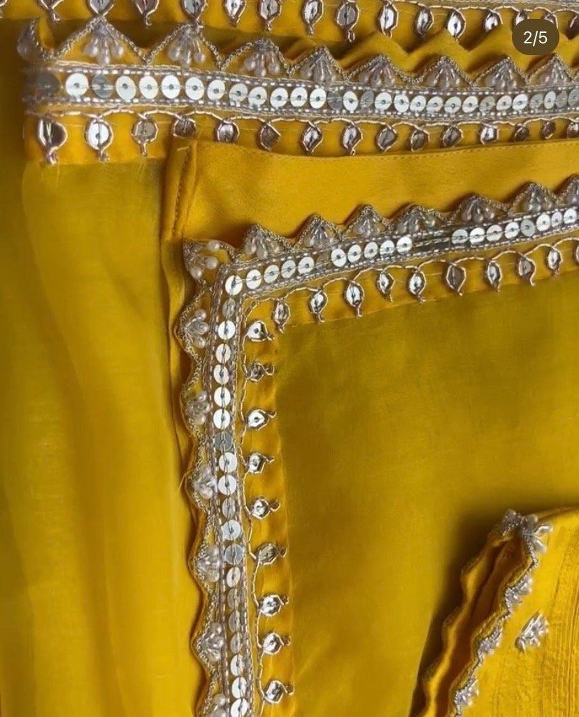 Yellow Organza Silk Saree: Hand-Embroidered Maggam Blouse