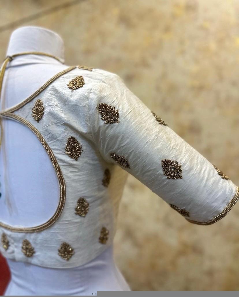 Cream Silk Saree Blouse: Hand Embroidered Zardosi Maggam