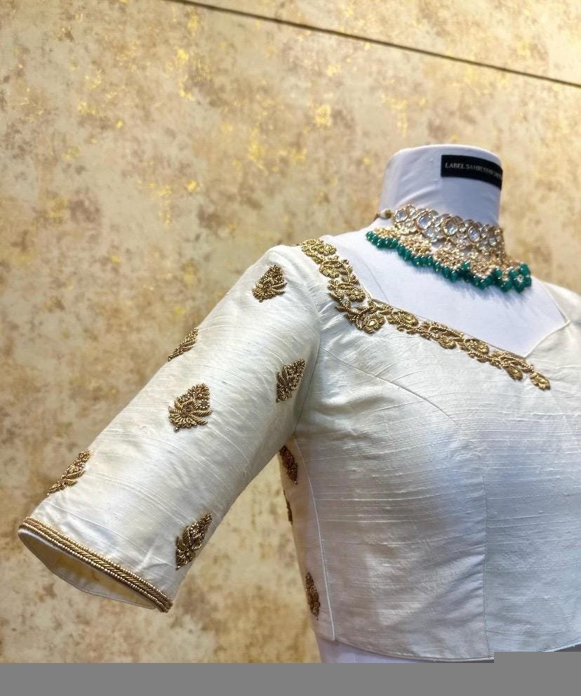 Cream Silk Saree Blouse: Hand Embroidered Zardosi Maggam