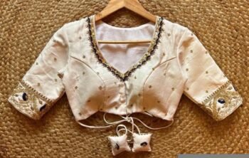Cream Silk Saree Blouse: Hand Embroidered Zardosi Maggam Work