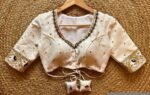 Cream Silk Saree Blouse: Hand Embroidered Zardosi Maggam Work
