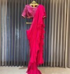 Pink Georgette Ruffle Saree: Hand-Embroidered Silk Blouse & Belt